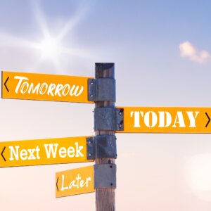 Signpost that points people to either put off work or do it today