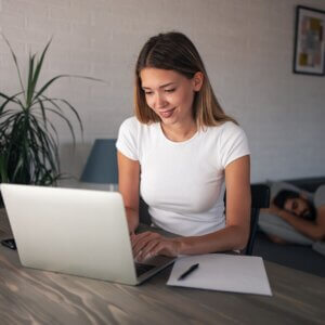 woman taking online course