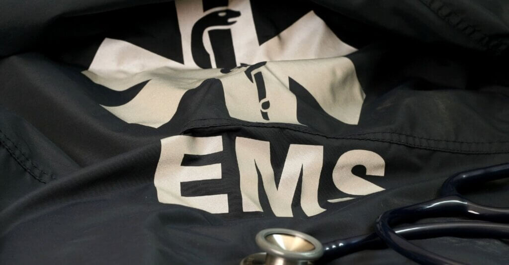 EMS jacket with stethoscope lying on it