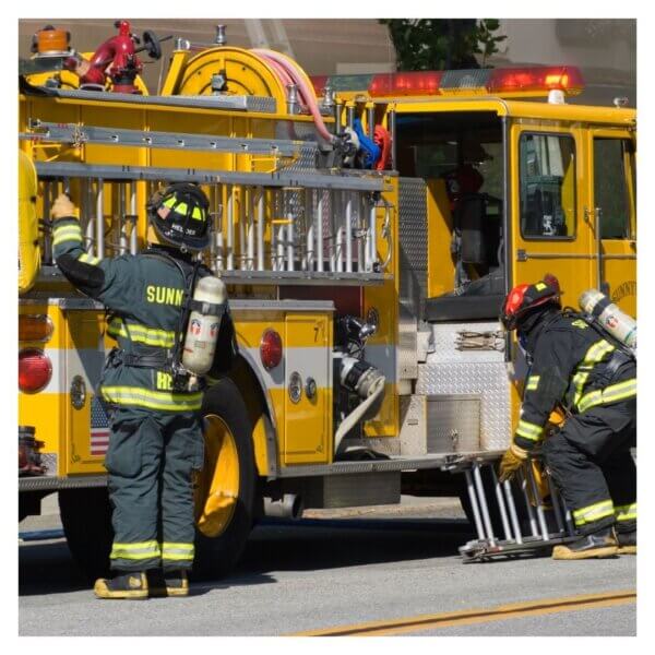 firefighters working on rig